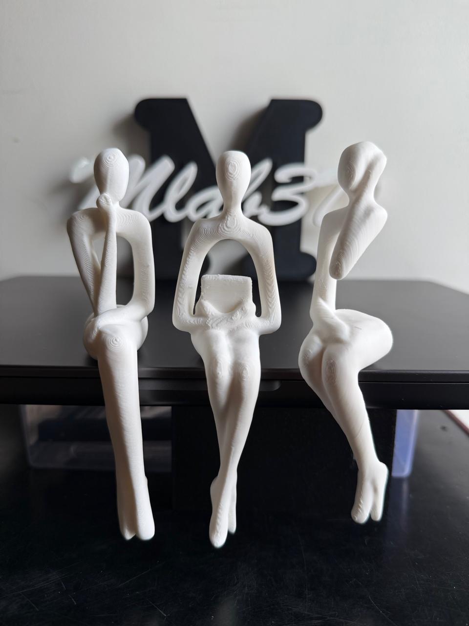 Abstract Sitting Human Sculpture